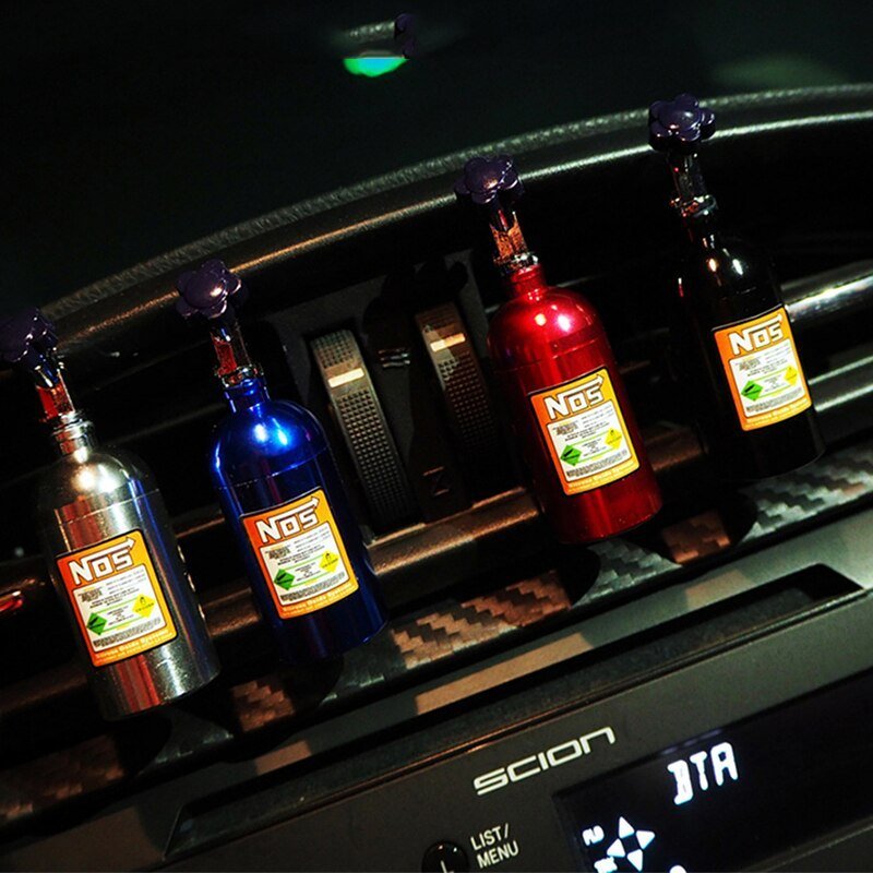 NOS style air fresheners displayed in a car interior with LED lighting for automotive lifestyle look