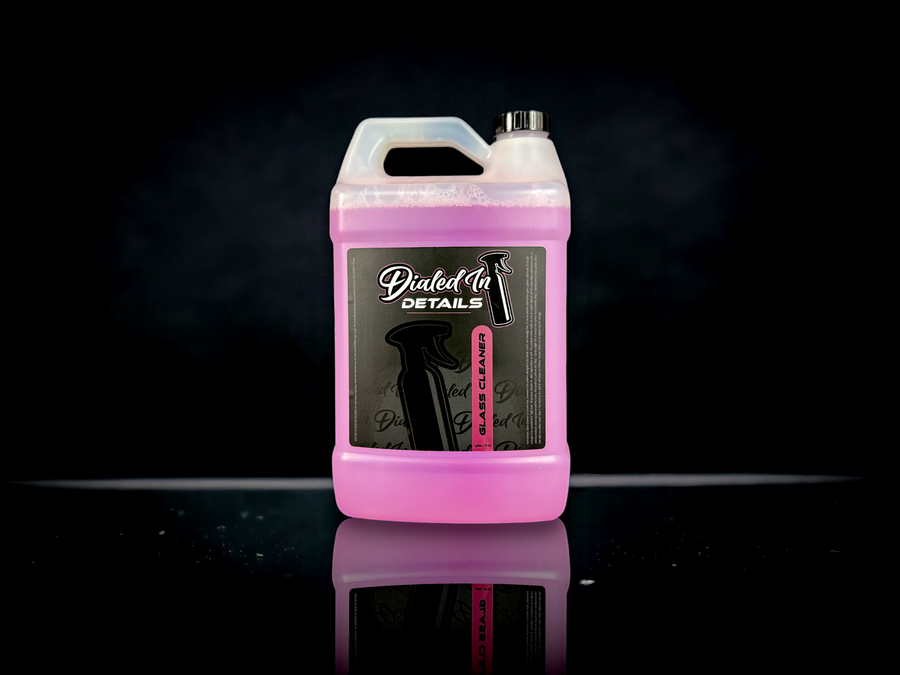 Cleaning automotive windshield with Dialed In Details Glass Cleaner