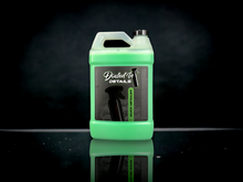 Load image into Gallery viewer, Dialed In Details Quick Detailer used as a waterless wash on vehicle exterior
