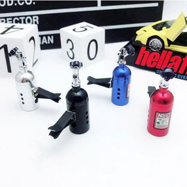 NOS bottle air fresheners and turbo keychain set with multiple color options on display