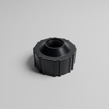 Black TUFF JUG storage cap with integrated 1 inch NPT threaded opening for racing fuel jug accessories
