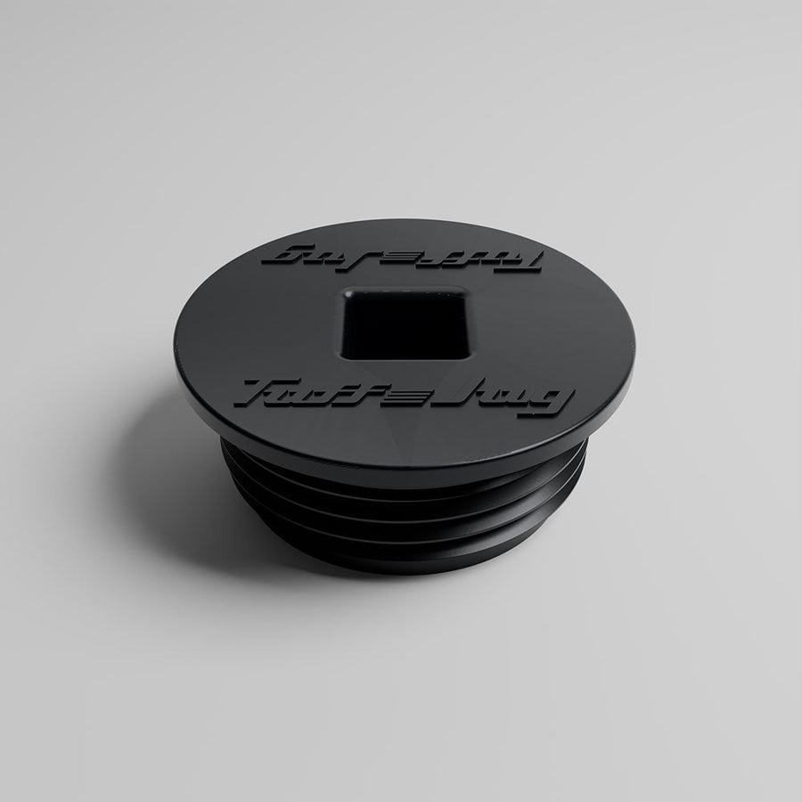 Angled view of TUFF JUG black threaded storage cap for Auto Stop fuel spout compatibility