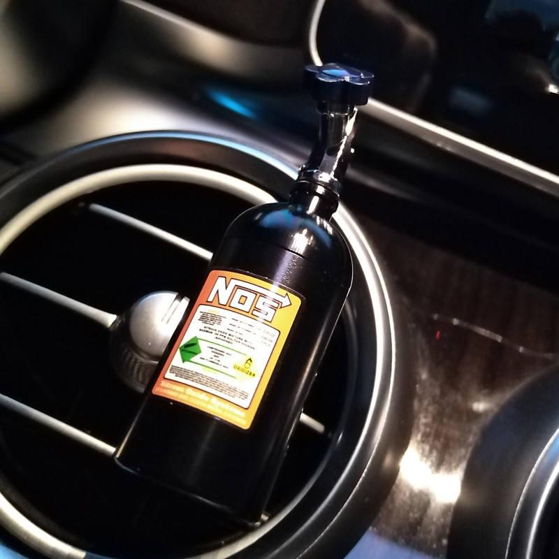 black NOS nitrous bottle air freshener in vehicle air conditioner vent