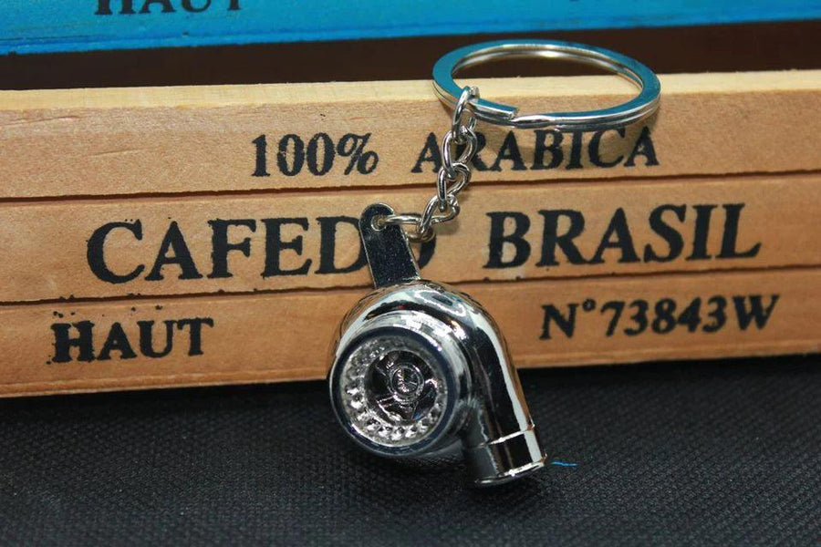 Spinning stainless steel turbo keychain with rotating turbocharger impeller